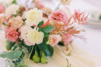 a bright floral centerpiece for a pastel wedding