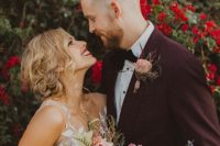 01 This couple went for a dramatic and moody fall wedding with lush and bright florals