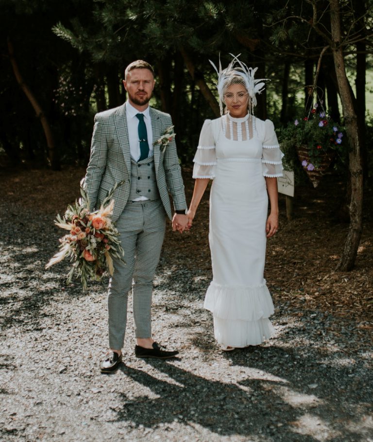 This couple went for a non traditional and cool wedding, and you can easily see that from their outfits