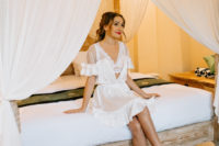 02 The bridal morning was romantic and she tried on a beautiful ruffle robe and chic lingerie