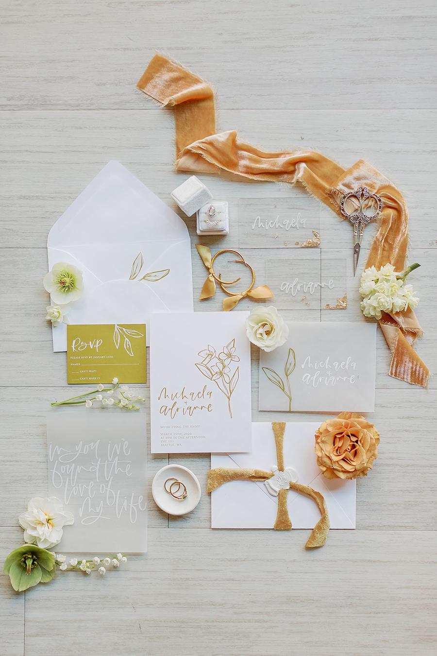 The wedding stationery was done with mustard and rust touches, with floral and gold leaf touches