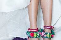 03 She finished off her look with crazy colorful shoes with flowers and fringe