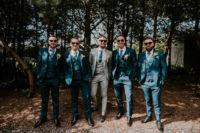 04 The groom was wearing a plaid three-piece suit, a blue tie and moccasins, the groomsmen were rocking navy three-piece suits
