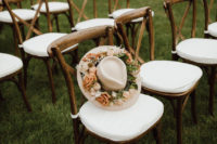 06 The bride was rocking a cream hat decorated with rust and blush blooms and greenery