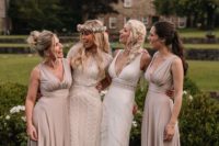 07 The bridesmaids were wearing champagne-colored draped maxi dresses with depe necklines