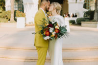 08 The wedding bouquet was bright, it was done with tropical blooms and leaves and bold colors