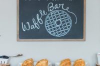 08 a small waffle bar with a chalkboard sign, waffles, berries and fruits, toppings and syrups is simple and awesome