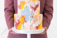 10 The wedding cake was super bright brushstroke one, in all the colors that were featured in the shoot