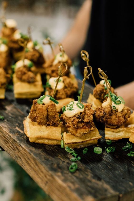 chicken and waffle appetizers topped with mayo and green onion are a delicious idea