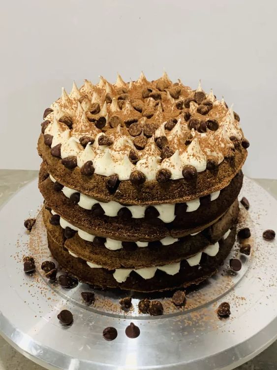 a chocolate waffle wedding cake with cream, meringues, chocolate chips is a delicious idea