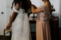 02 The bride was wearing a very romantic lace mermaid off the shoulder wedding dress with a tulle cover