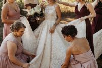 03 The wedding dress was a super romantic floral ballgown with an illusion neckline, the bridesmaids were wearing dusty pink and burgundy