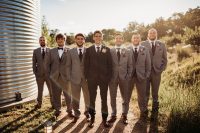 04 The groom was wearing a dark grey three-piece suit and the groomsmen were rocking dark waistcoats and lighter suits