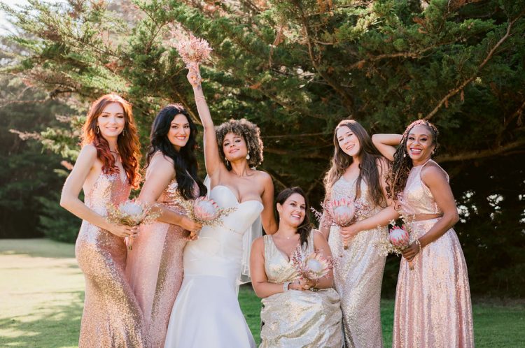 The bridesmaids were rocking gorgeous mismatching gold and rose gold sequin gowns