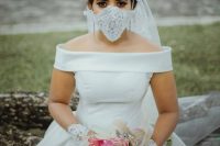 06 a lace embellished face mask is a lovely and romantic wedding accessory to highlight your bridal look