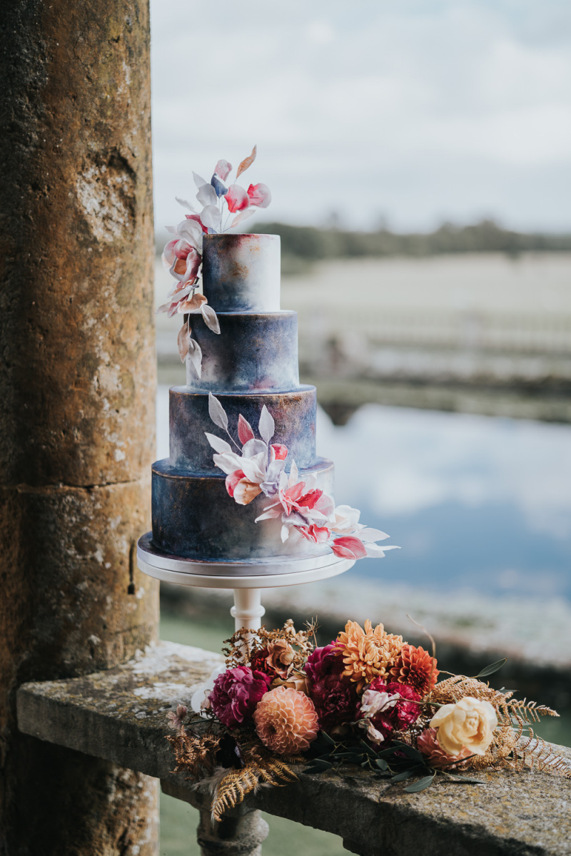 The wedding cake was a beautiful celestial one, with bold blooms