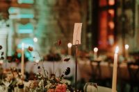10 The wedding centerpieces featured much texture and interest plus candles