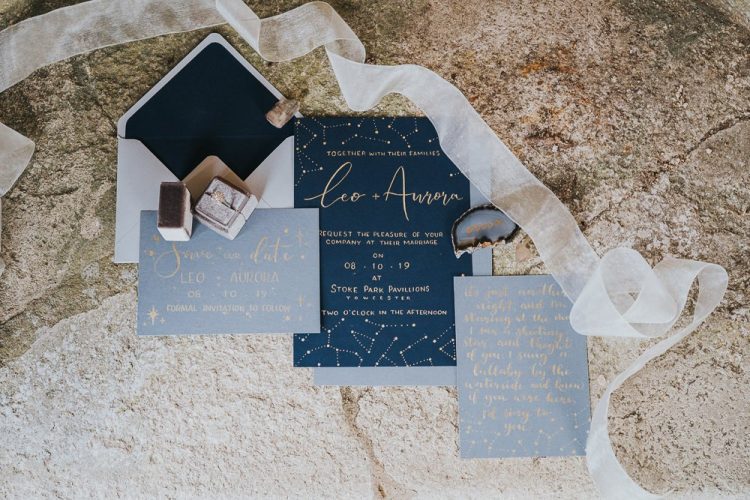 The wedding stationery was also celestial, with grey and navy invites and gold prints