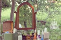 11 a vintage-styled wedding sanitizer station with various types of sanitizers is a smart idea