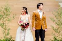 02 The bride was wearing a refined lace wedding dress with an overskirt, the groom was rocking a mustard velvet blazer with black pants and a grey bow tie