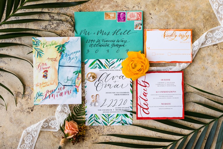 The wedding stationery was colorful, with handpainting and coasts