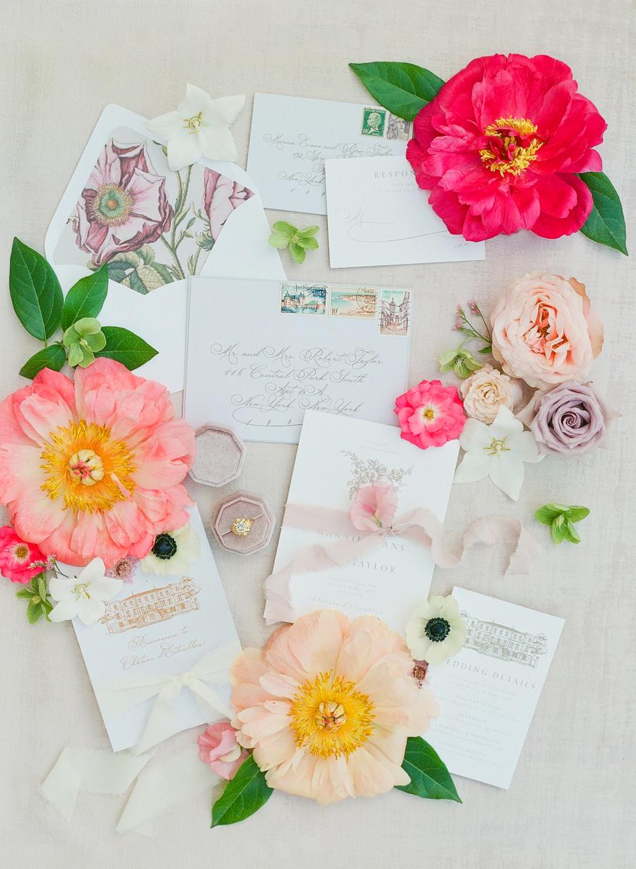 The wedding stationery was done with chateau pictures and floral lining and looked chic