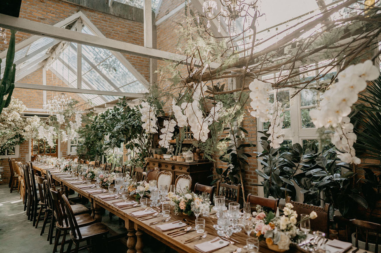 The venue was adorable, filled with natural light, white orchids, greenery, vintage furniture and neutral and pastel blooms on the table
