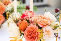 07 The wedding florals were done bright, with pink, peachy and rust shades