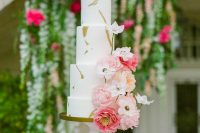 08 The wedding cake was decorated with gold leaf and again fresh blooms in pink and blush