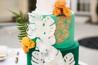11 The wedding cake was a real masterpiece, in green, white and gold, with sugar monstera leaves