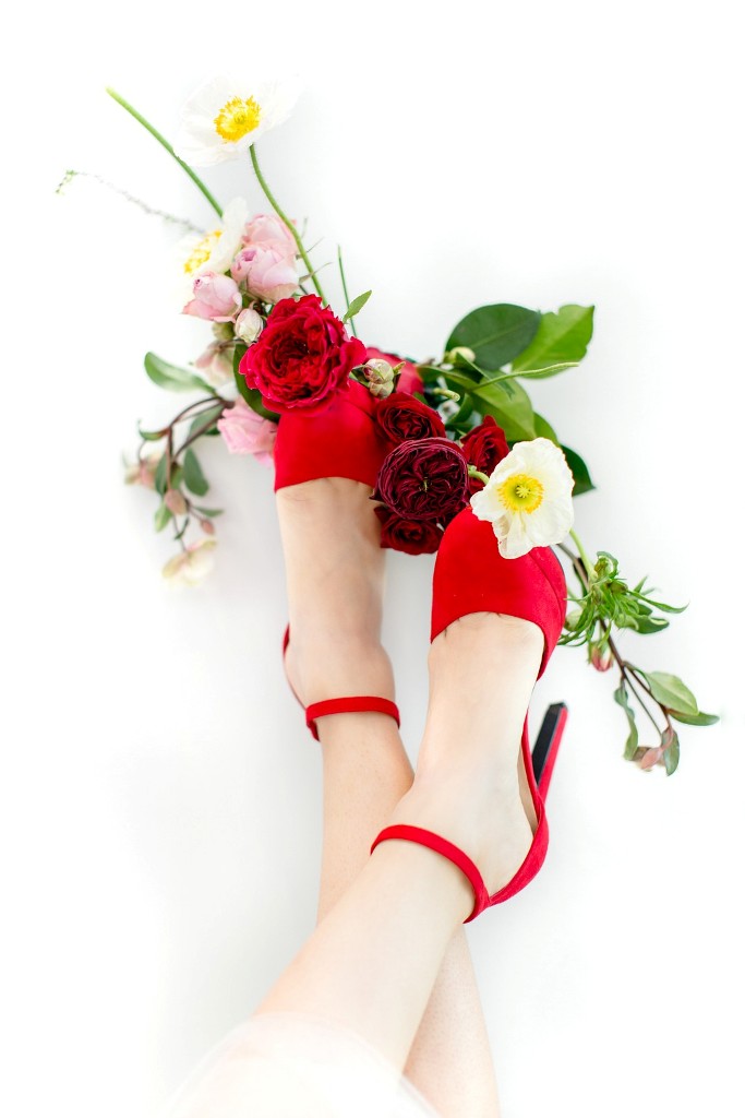 The bride was rocking amazing hot red heels with ankle straps to finish off her look
