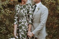 01 This fall wedding was done in green and white, with a cozy feel and a chic printed wedding dress