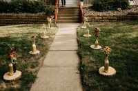 02 The ceremony took place on the couple’s front porch, the path was lined with blooms in gold bottles
