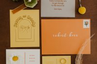 02 The wedding stationery was done with rust, mustard and orange colors