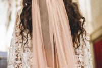 02 a blush veil attached to a fresh flower crown for giving an ultimate boho look to the bride