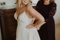 03 The bride was wearing a simple A-line wedding dress by BHLDN with a train