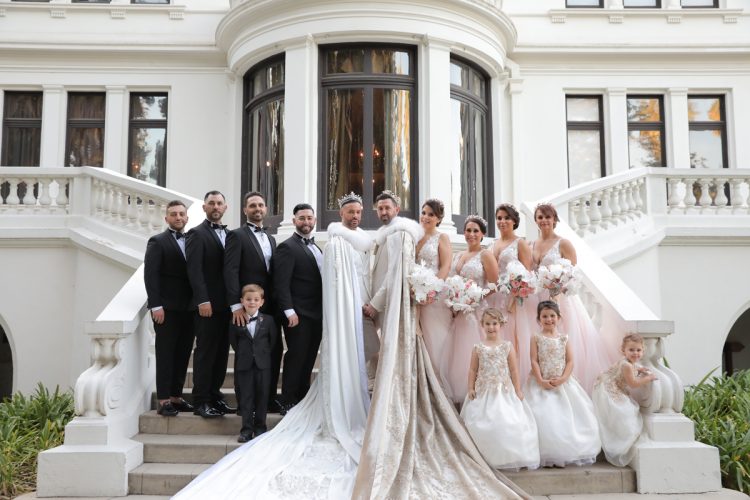The bridesmaids were wearing blush embellished dresses, the groomsmen were wearing black tuxes