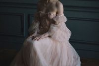 06 a blush off the shoulder tulle wedding dress with a lace corset and puff sleeves is a very romantic gown
