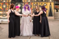 07 The bridesmaids were wearing black draped A-line maxi dresses