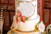 a hand painted boho wedding cake design