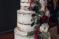 10 The wedding cake was a naked one, decorated with greenery, blush and white blooms and with pretty Frenchie toppers