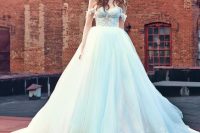 15 a breathtaking off the shoulder wedding ballgown with a lace bodice and straps, a train and a statement headpiece