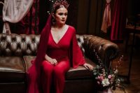 16 a deep red wedding jumpsuit, a jaw-dropping crown and earrings plus an ombre deep red to pink veil for a color-loving bride