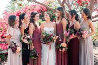 03 The bride was wearing a strapless floral wedding dress, the bridesmaids were rocking berry-hued dresses
