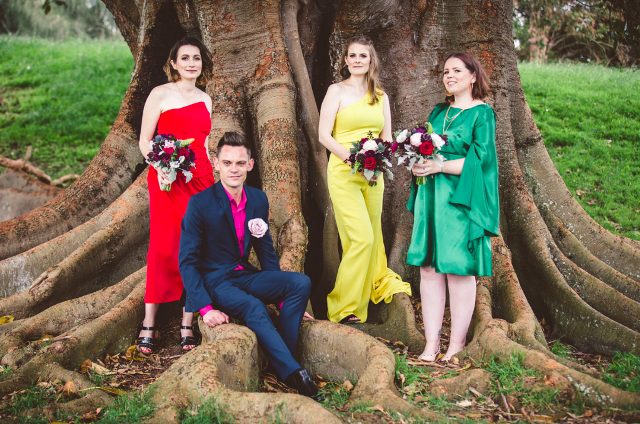 The bridesmaids and a bridesman were rocking all bold shades - yellow, emerald, red and hot pink