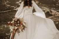 04 The bride was wearing a boho wedding dress with puff sleeves, a boho lace bodice and a plain skirt plus a floral headpiece