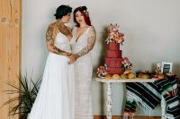 04 The second bride was wearing an A-line wedding dress with an embellished bodice and a pleated skirt, both girls were rocking bright hair