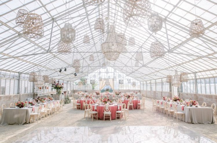 The wedding reception was done airy, with woven lamps and chandeliers