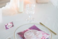 05 The wedding tablescape itself was simple, with a blush runner, candles, a sheer charger and gold cutlery , yet bright linens