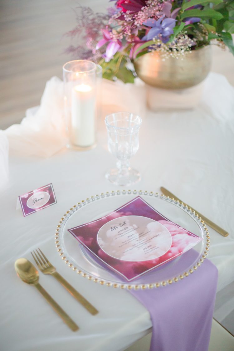 The wedding tablescape itself was simple, with a blush runner, candles, a sheer charger and gold cutlery , yet bright linens